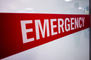Red emergency room signs and patients who look scary.