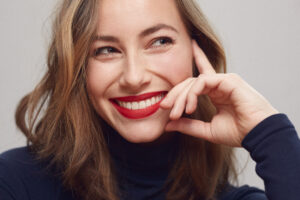 Portrait of a happy and beautiful woman with a big smile on her