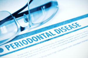 Periodontal Disease - Medicine Concept with Blurred Text and Glasses on Blue Background. Selective Focus. 3D Rendering.