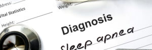 Diagnostic form with diagnosis Sleep apnea and pills.