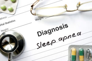 Diagnostic form with diagnosis Sleep apnea and pills.